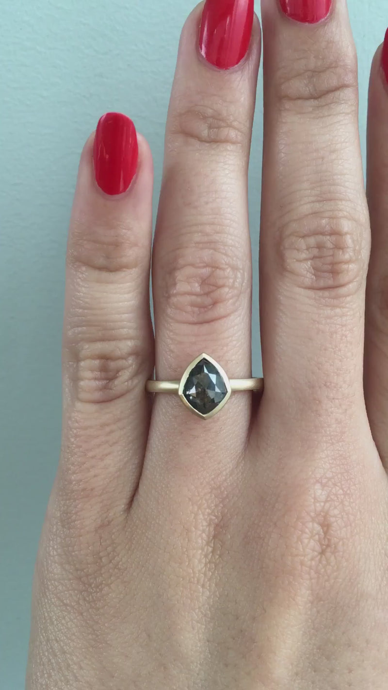 caption:Shown with 1.5ct kite cut grey diamond in 14k yellow gold