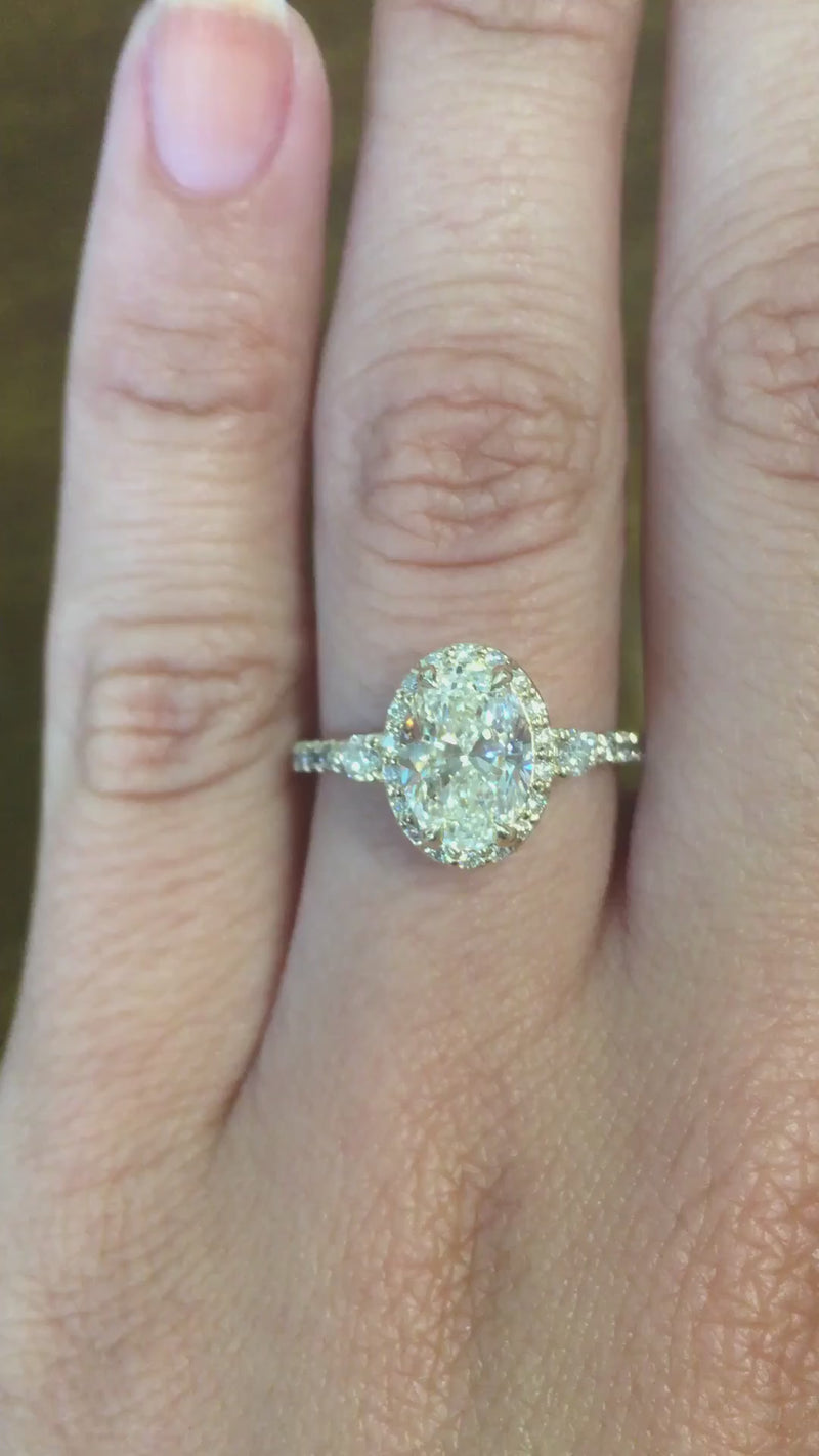 caption:Shown with 1ct oval diamond in 14k yellow gold