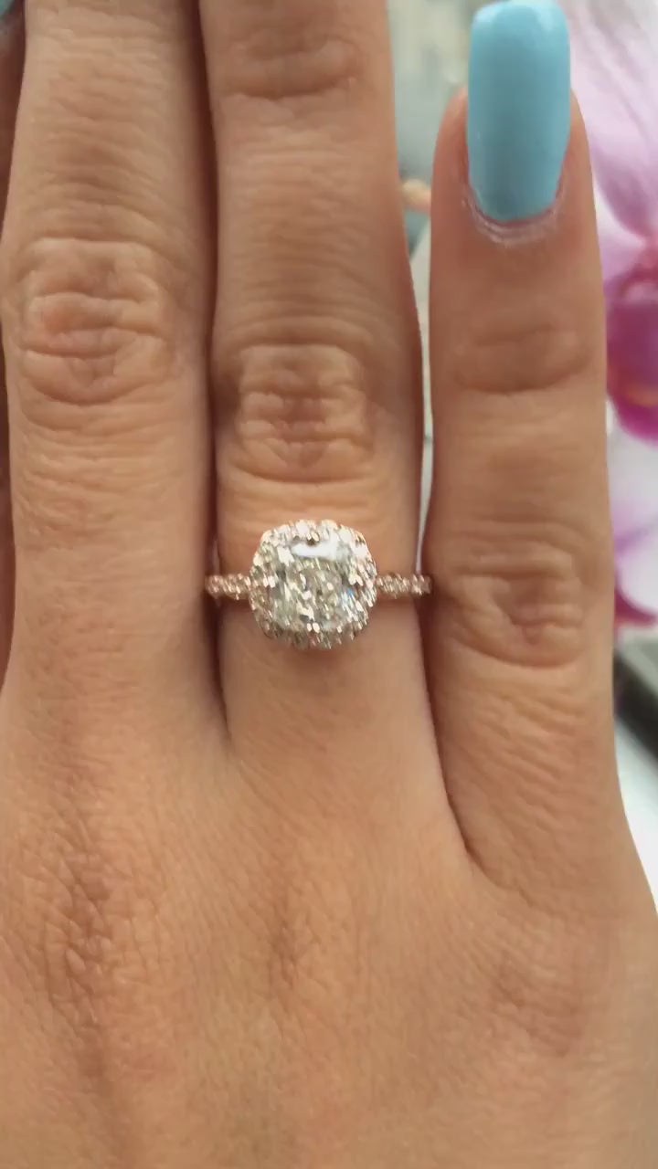 caption:Shown with cushion cut diamond in 14k rose gold