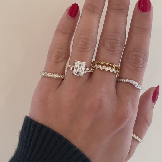 caption:Shown with 3ct emerald cut in 14k yellow gold 