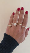 caption:Shown with 3ct emerald cut in 14k yellow gold 