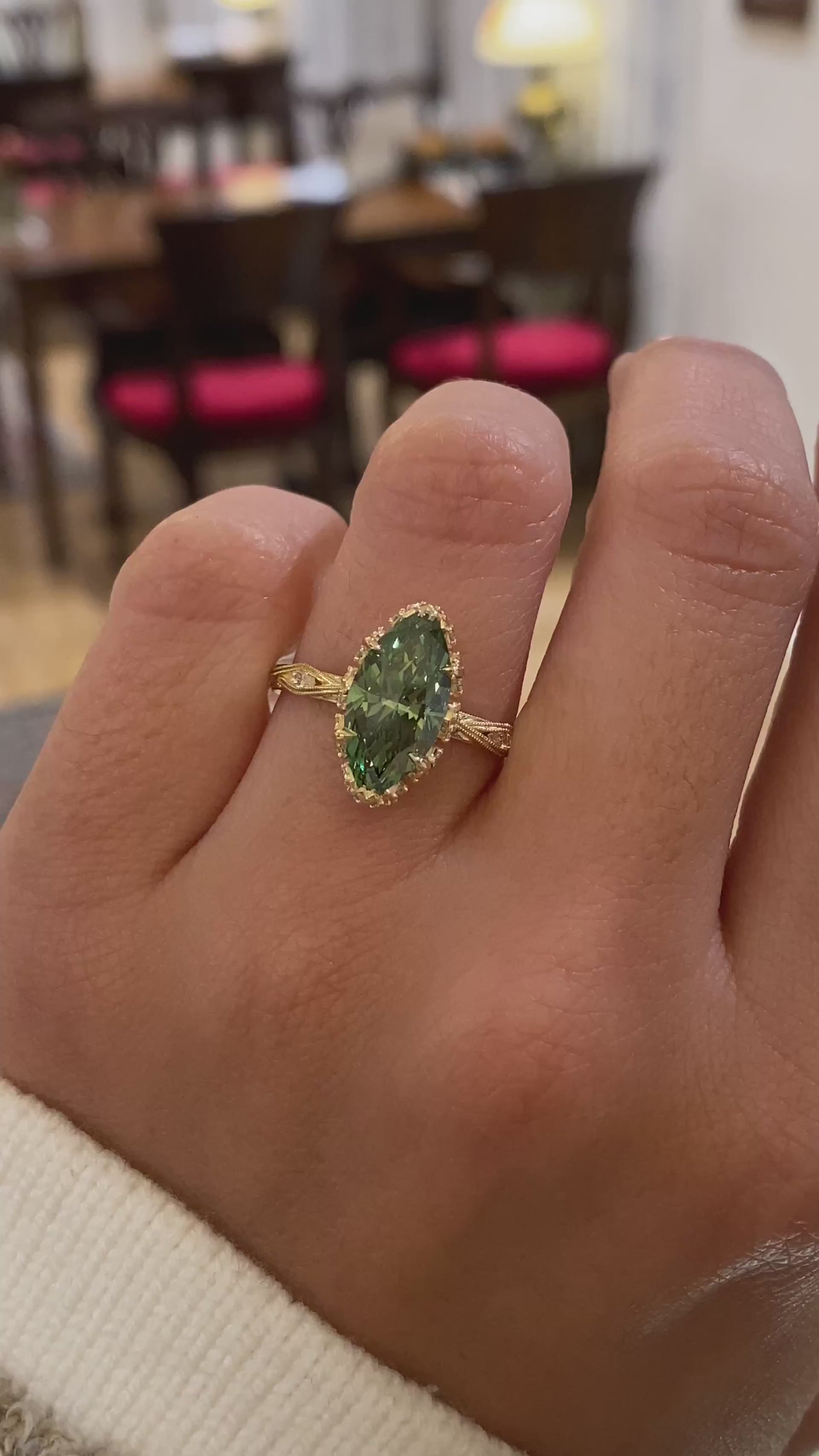 caption:Shown with 2.5ct fancy green marquise in 14k yellow gold 
