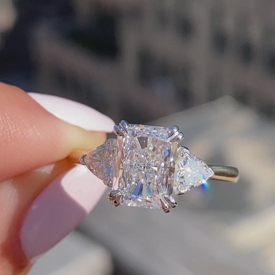 caption:Shown with 2.2ct radiant cut white diamond in mixed metal setting