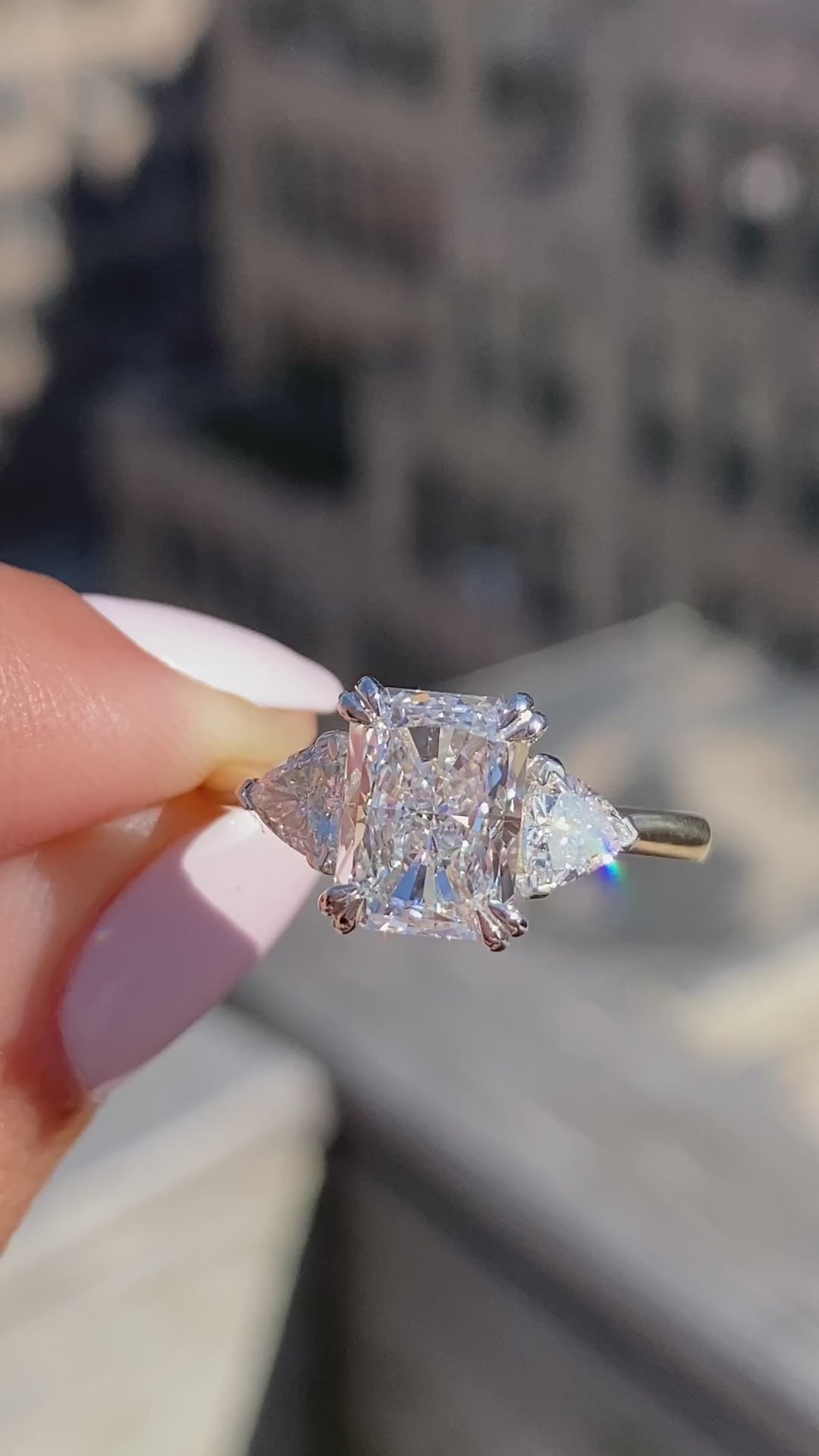 caption:Shown with 2.2ct radiant cut white diamond in mixed metal setting