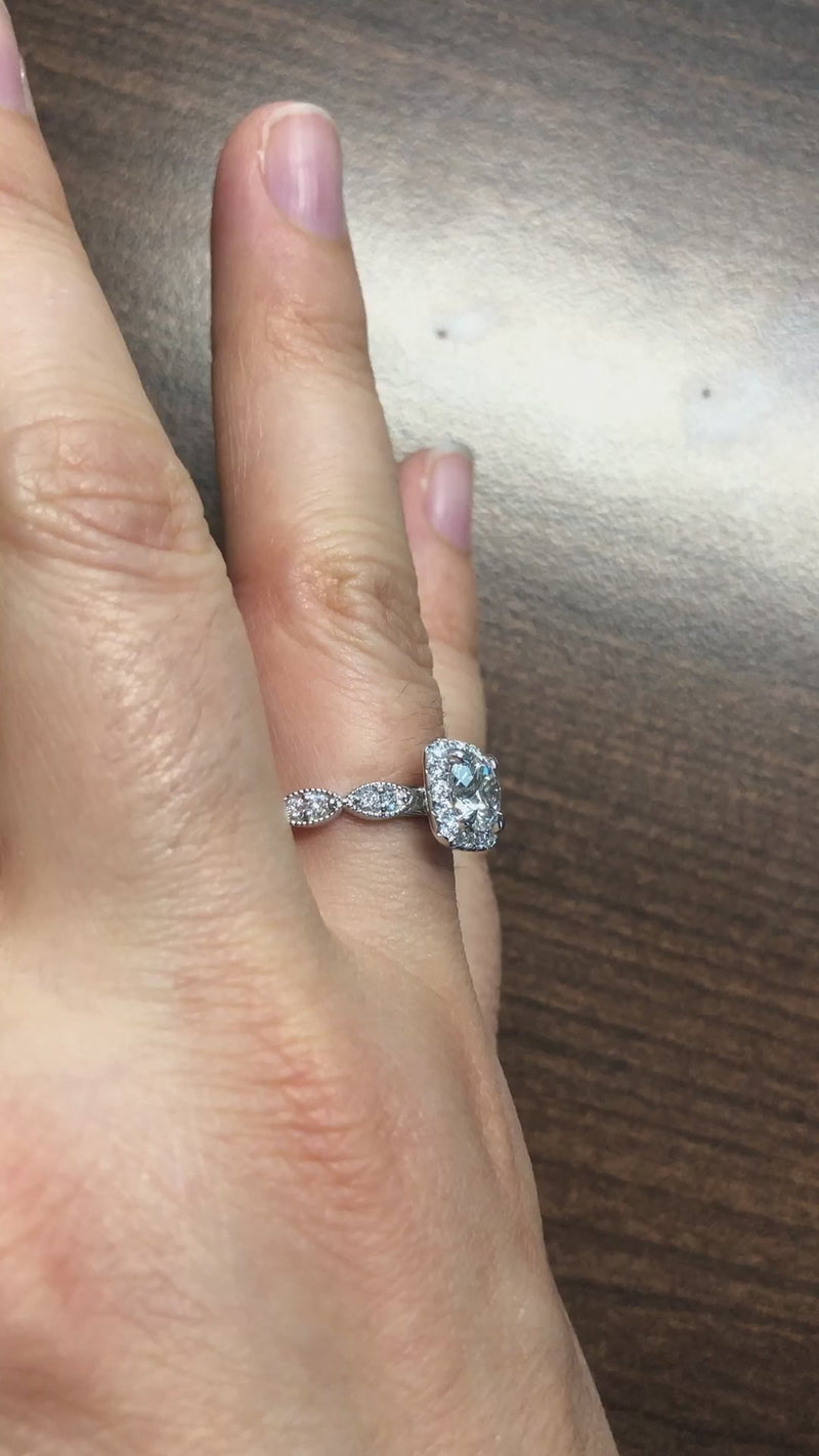 caption:Shown with round diamond in platinum