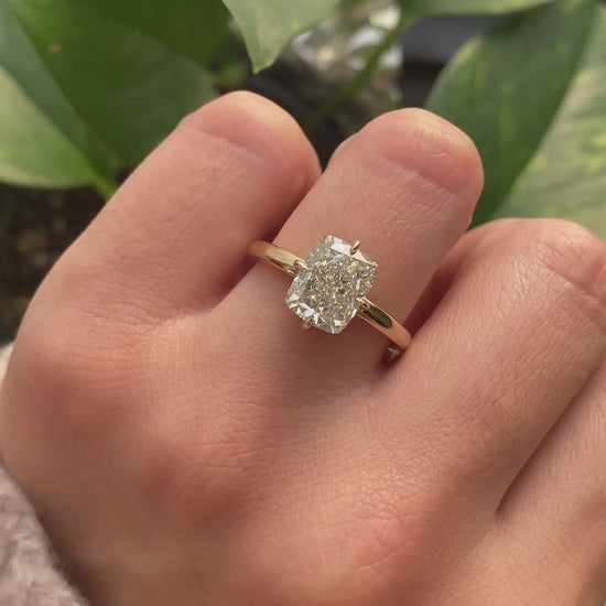 caption:Shown with 3ct cushion cut in 14k yellow gold 