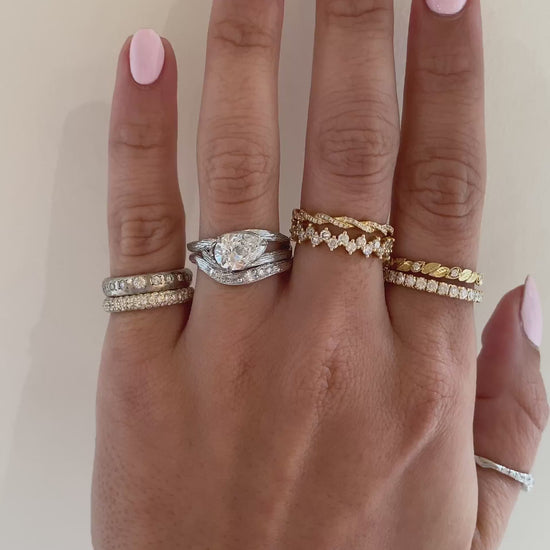 caption:Shown with 1.5ct pear diamond in white gold, stacked with Isle