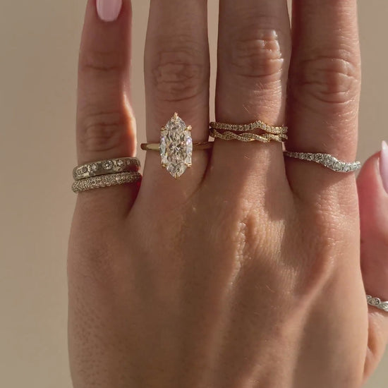 caption:Shown with 3ct marquise in 14k yellow gold 