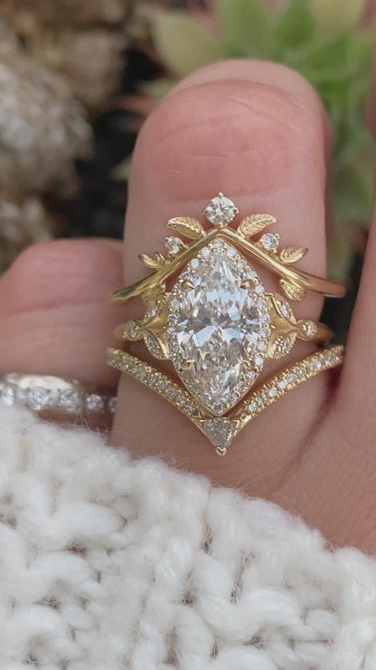 caption:Shown in a custom curve, paired with Rachael - Marquise engagement ring and Kia wedding band