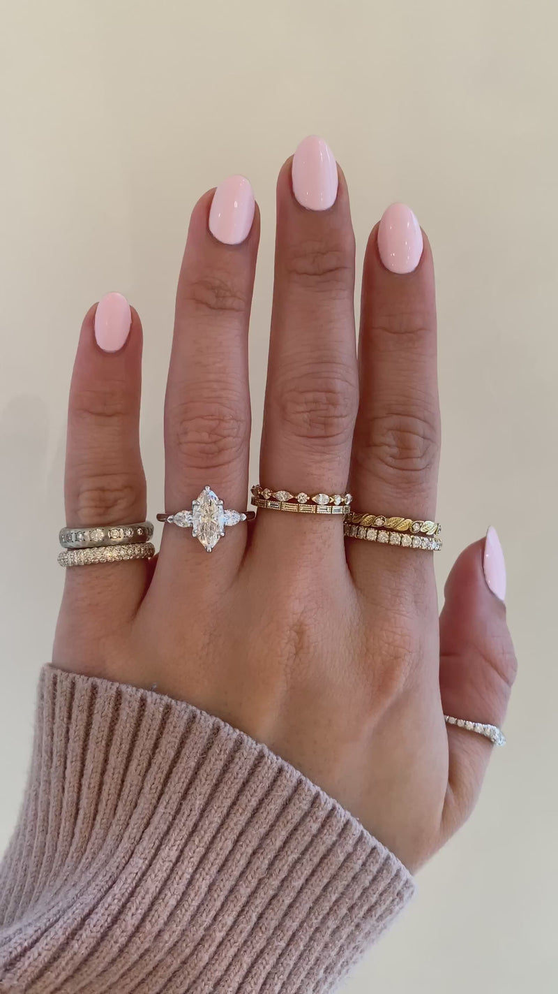 caption:Shown with 1.2ct marquise diamond in platinum