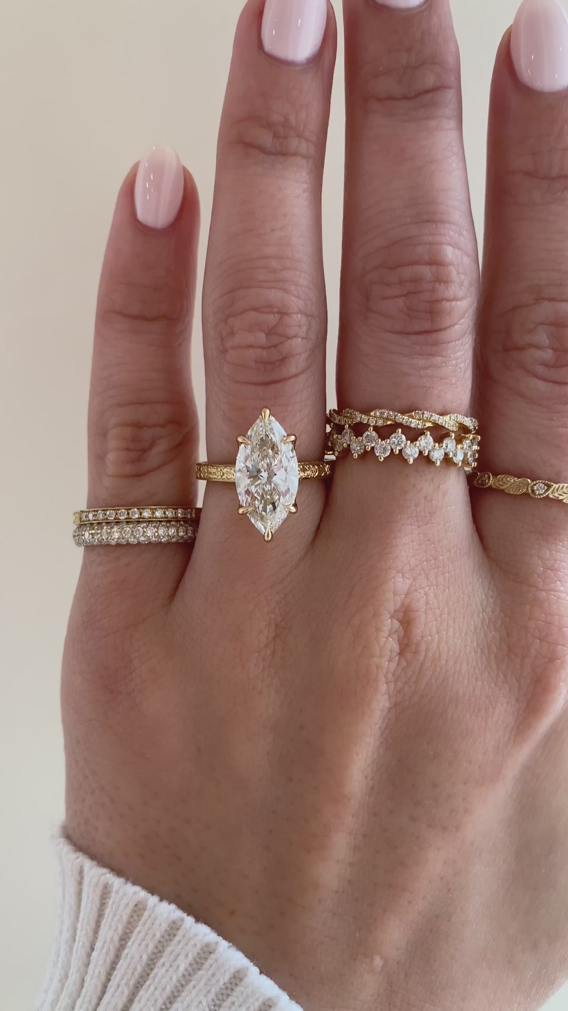 caption:Shown with 3ct marquise in 18k yellow gold, customized with surprise gemstone