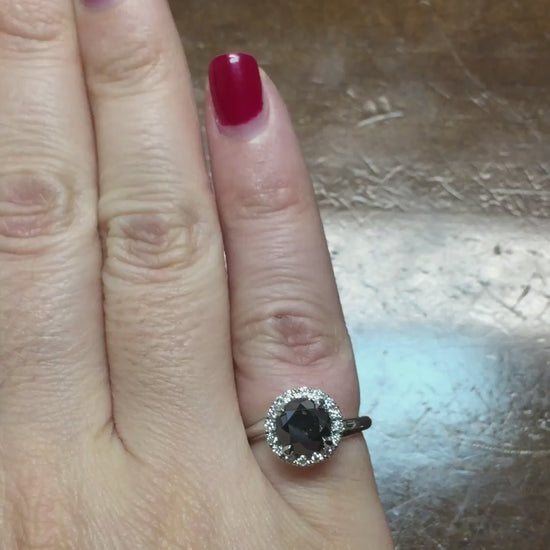 caption:Shown with 1.50ct round black diamond in 14k white gold