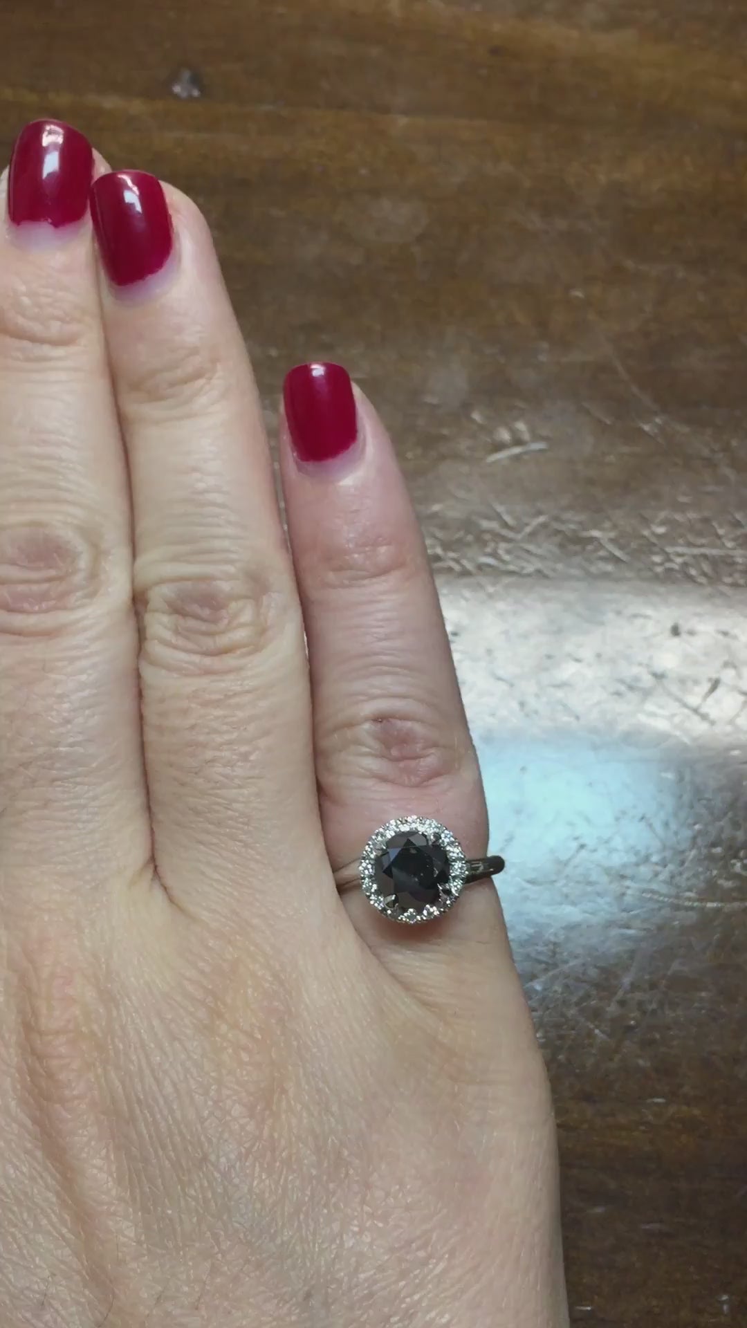 caption:Shown with 1.50ct round black diamond in 14k white gold