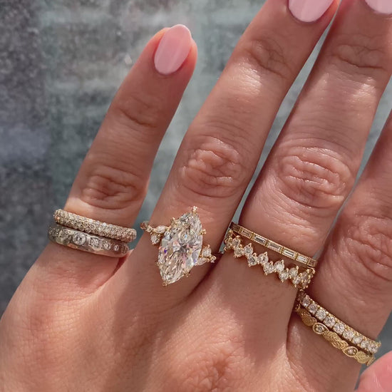 caption:Shown with 3.5ct marquise in 14k yellow gold