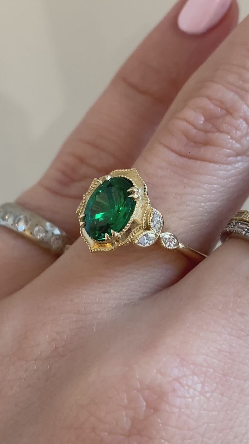 caption:Shown with 1.3ct oval emerald in 14k yellow gold