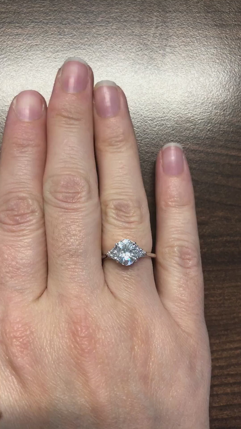 caption:Shown with 1.5ct oval diamond in platinum