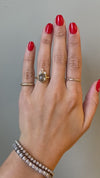 caption:Shown with 2.19ct hexagon grey diamond in 14k yellow gold
