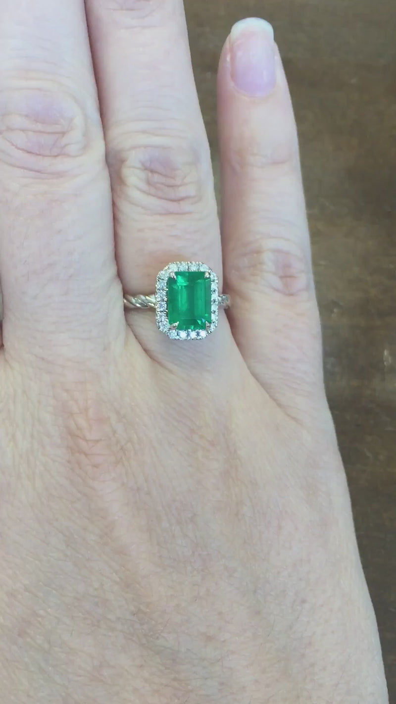 caption:Shown with emerald cut emerald in platinum