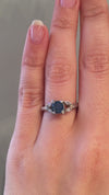 caption:Shown with round blue sapphire in  platinum