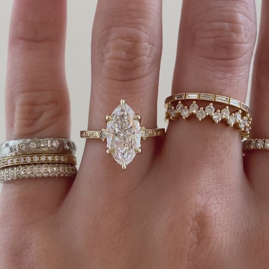 caption:Shown with 2.5ct marquise in 14k yellow gold