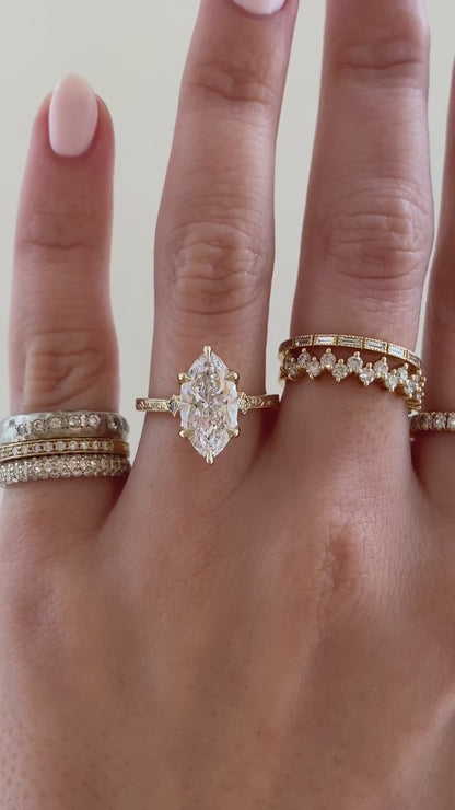 caption:Shown with 2.5ct marquise in 14k yellow gold
