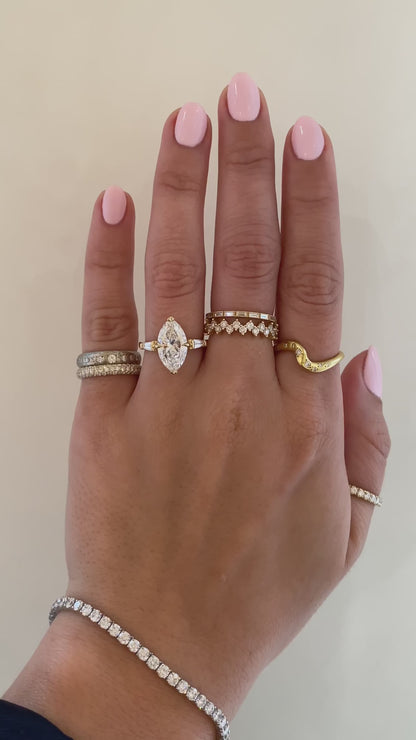 caption:Shown with 3ct marquise in 14k yellow gold 