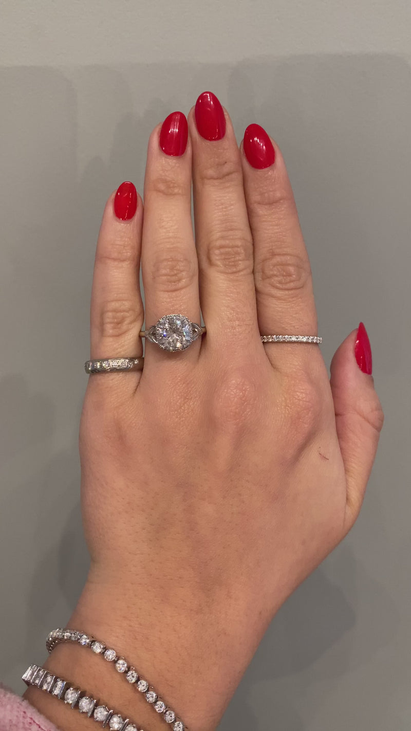 caption:Shown with 3ct cushion diamond in 14k white gold
