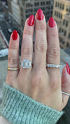 caption:Shown with 4.5ct emerald cut diamond in platinum