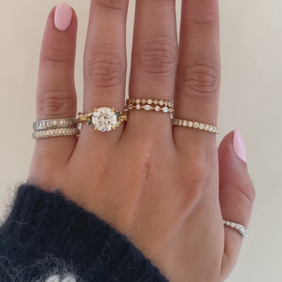caption:Shown with 2.5ct round cut in 18k yellow gold 