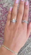 caption:Paired with Elaine engagement ring in platinum