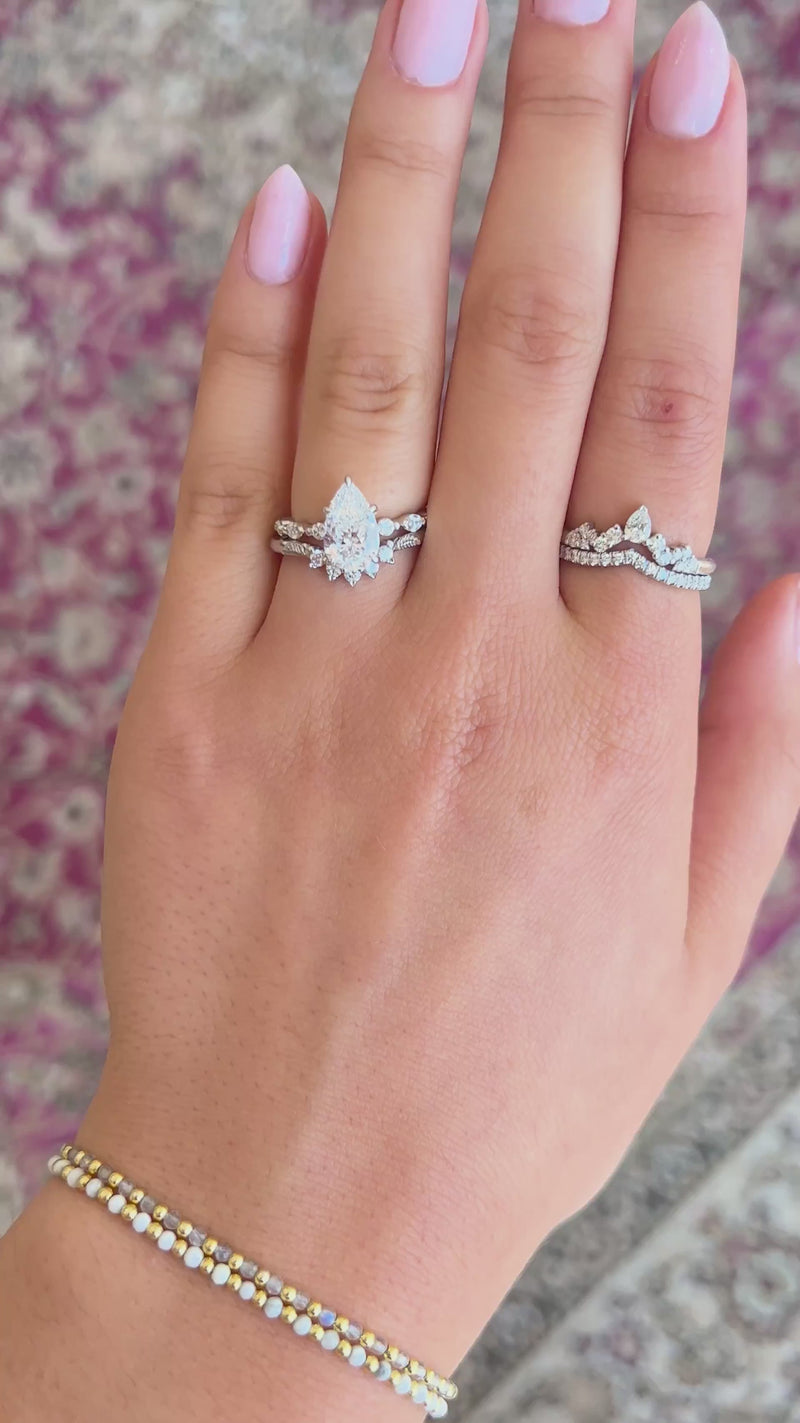 caption:Paired with Elaine engagement ring in platinum