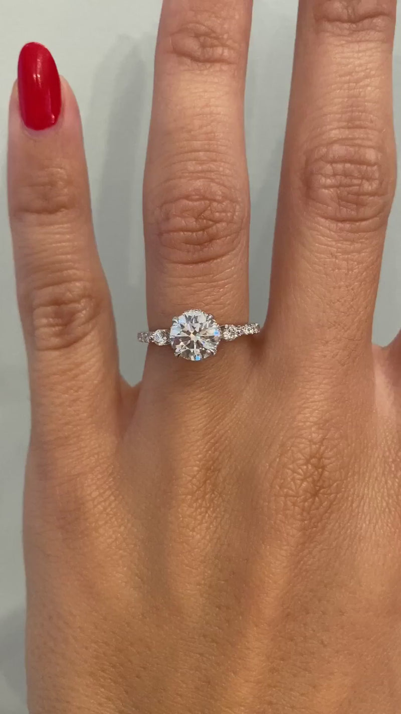 caption:Shown with 1.2ct round diamond in platinum
