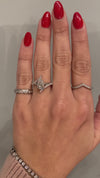 caption:Shown with 1.25ct pear diamond in platinum