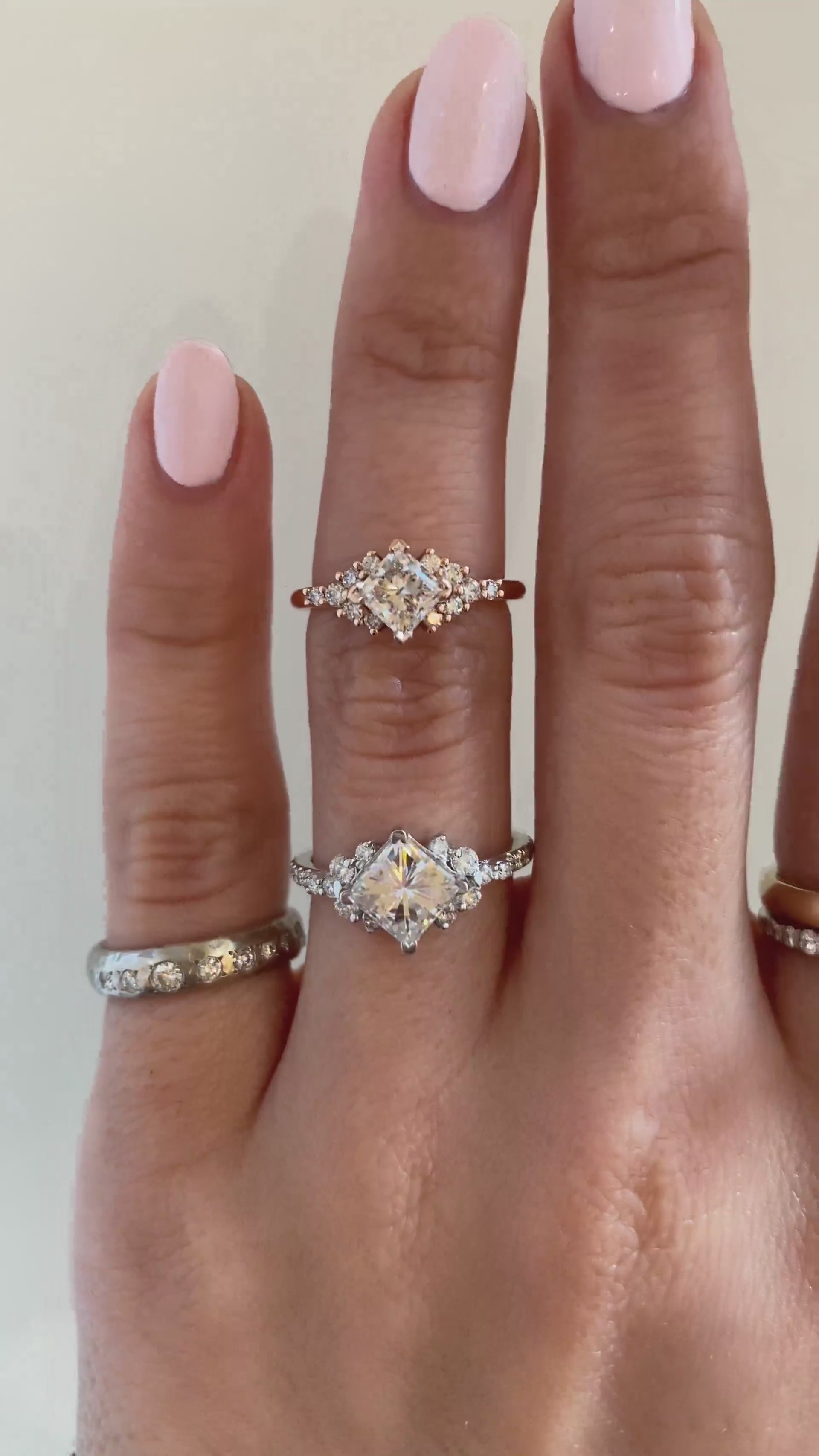 caption:Lottie 0.75ct princess next to Loxlynn 1.5ct princess