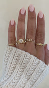 caption:Shown with 1.2ct round diamond, stacked with Elo wedding band