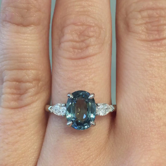 caption:Shown with 2.38ct oval sapphire in platinum