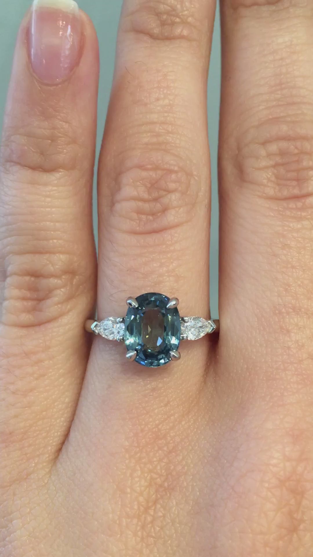 caption:Shown with 2.38ct oval sapphire in platinum