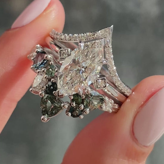 caption:Shown with 2ct marquise diamond, set designed in 14k white gold