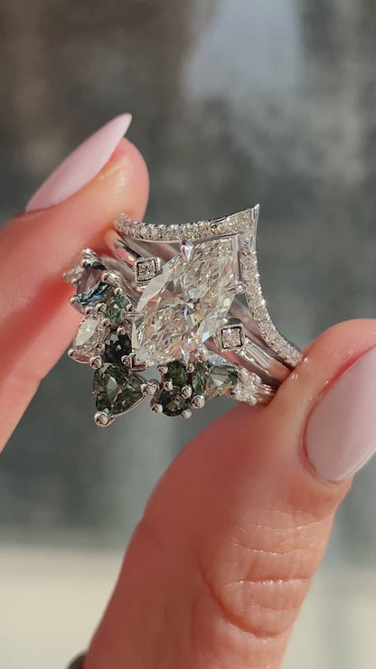 caption:Shown with 2ct marquise diamond, set designed in 14k white gold