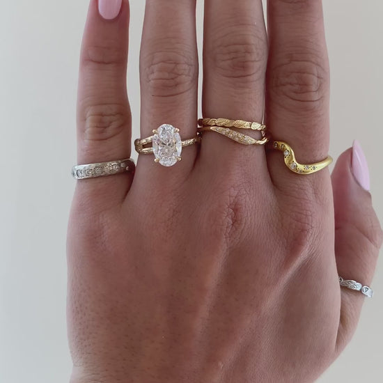 caption:Shown with 2.5ct oval in 14k yellow gold