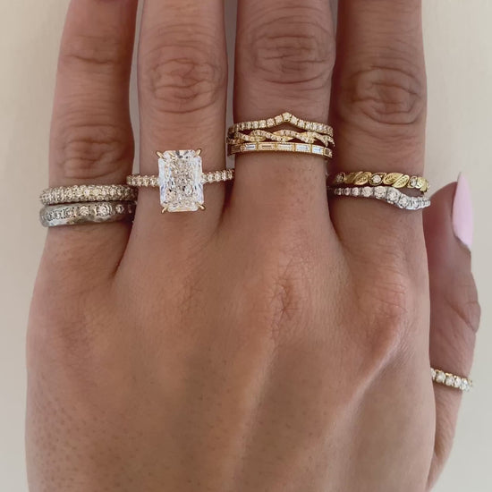 caption: Shown with a 3ct radiant cut diamond in 14k yellow gold
