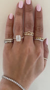 caption: Shown with a 3.2ct radiant cut diamond in 14k yellow gold

