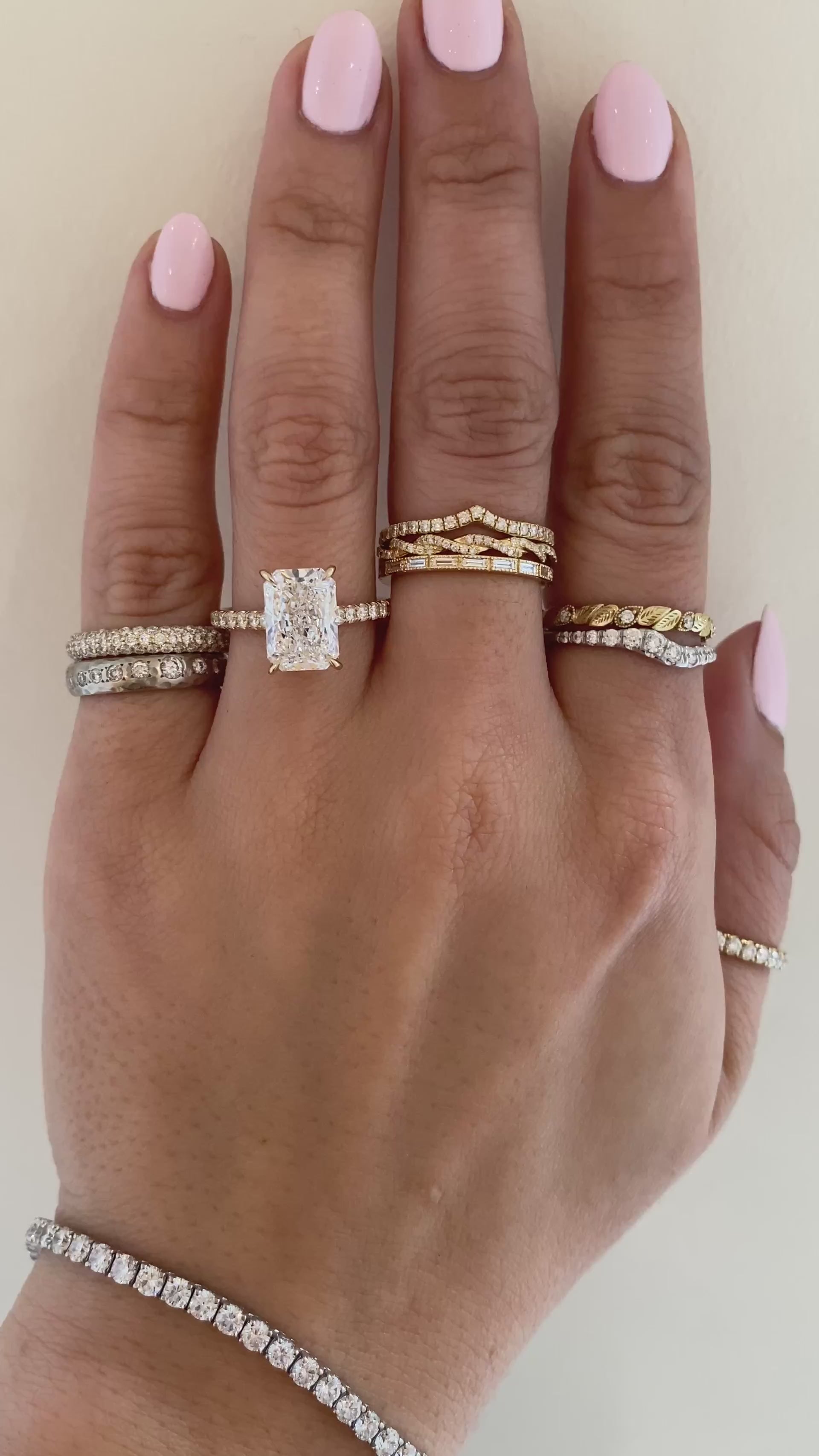 caption: Shown with a 3ct radiant cut diamond in 14k yellow gold
