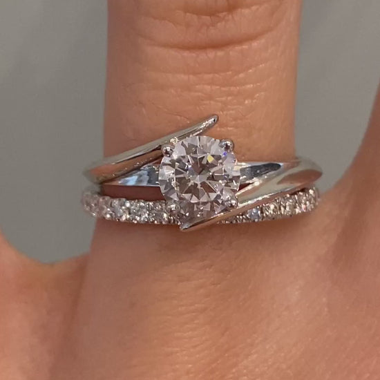 caption:Shown with 1ct round diamond and paired with Bella 2mm wedding band