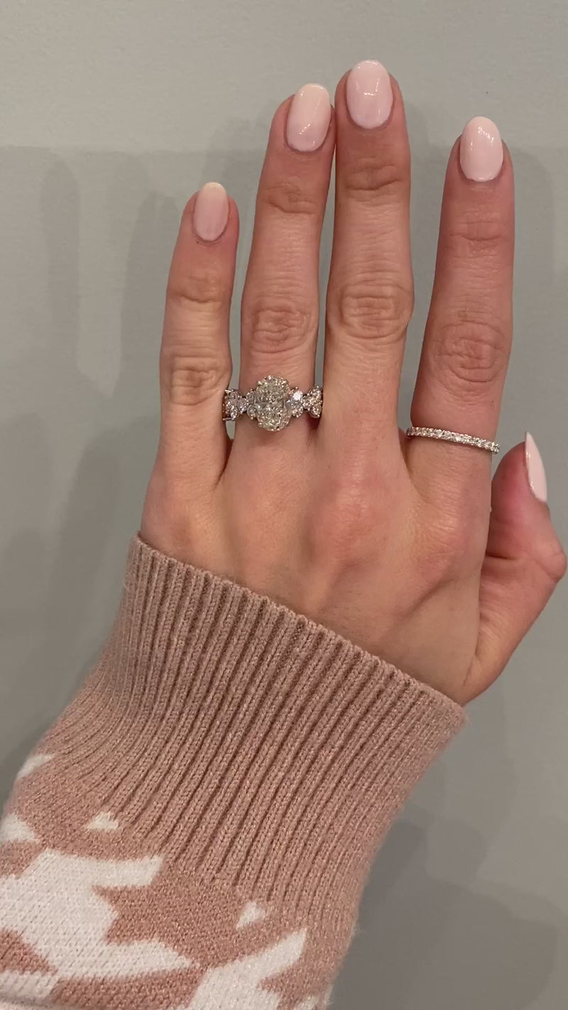 caption:Shown with 2.50ct oval diamond in platinum