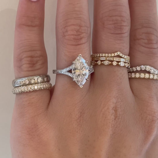 caption:Shown with 2.5ct marquise in platinum