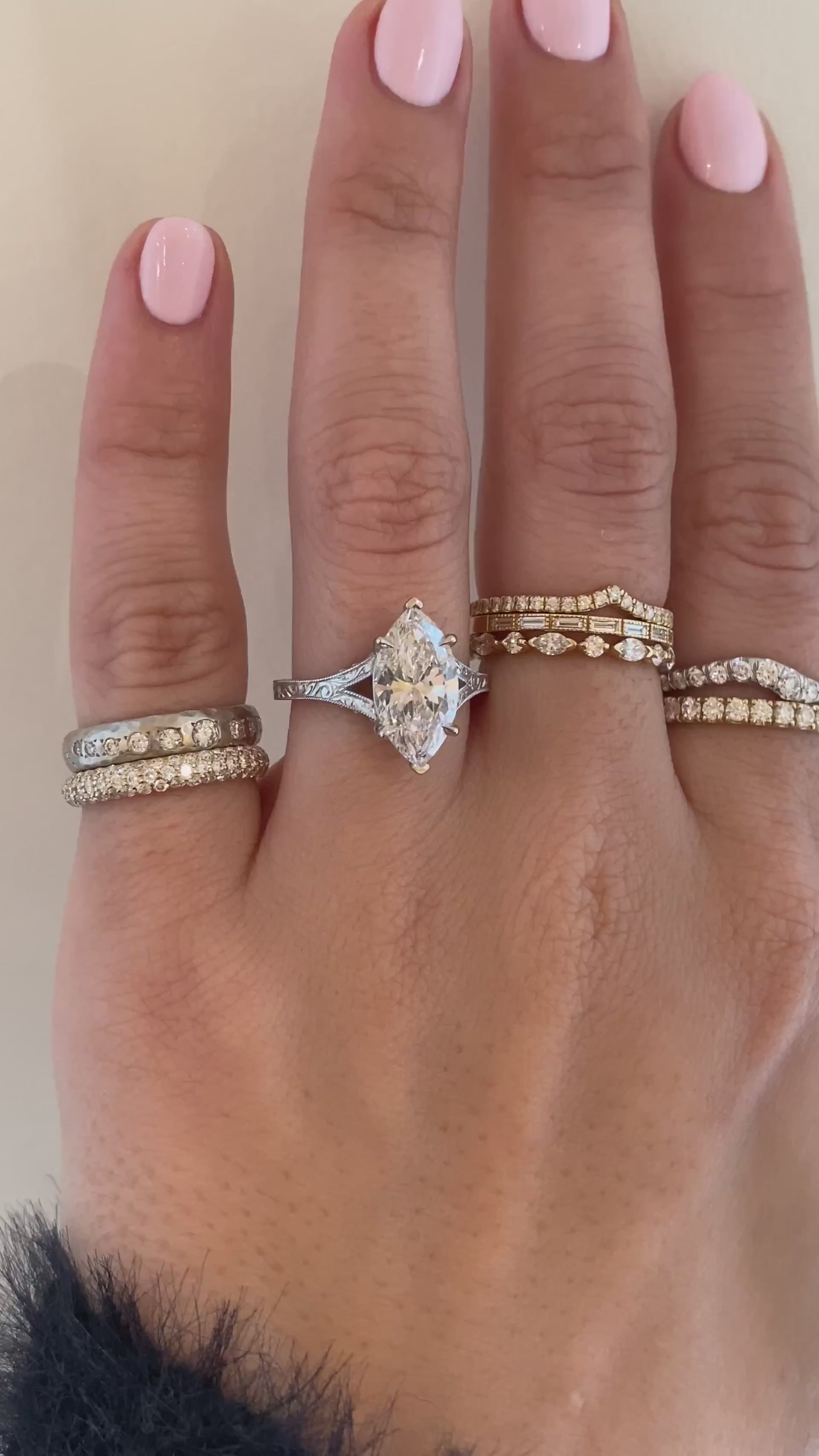 caption:Shown with 2.5ct marquise in platinum