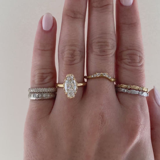 caption:Shown with 2ct marquise in 1k yellow gold
