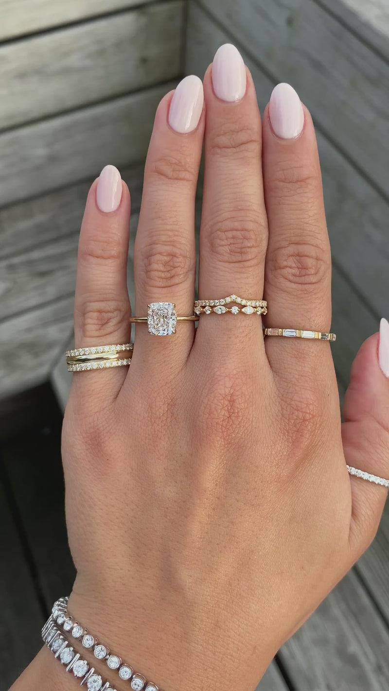 caption:Shown with a 2.5ct cushion cut diamond in yellow gold