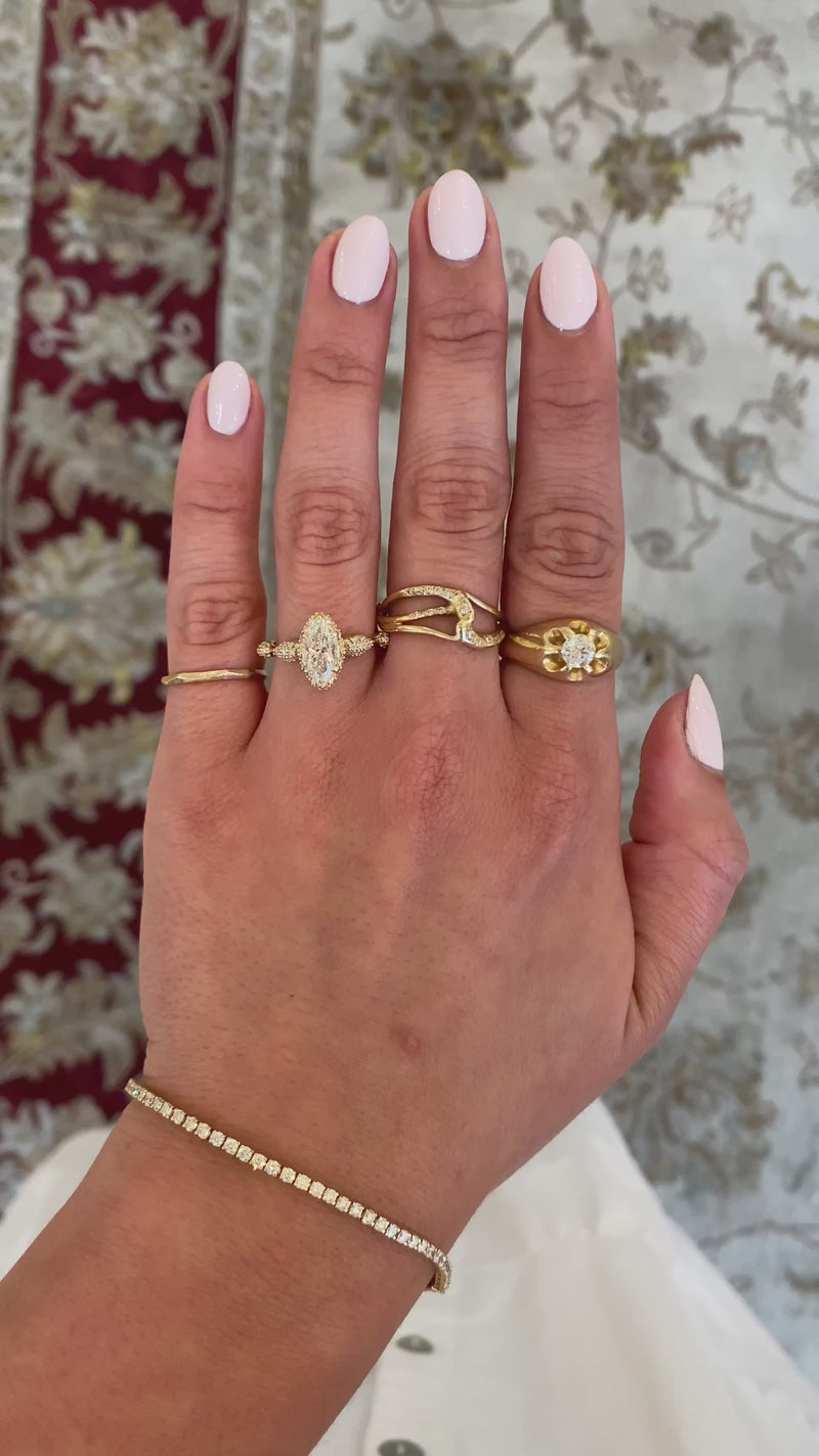 caption:Shown with 1ct marquise diamond in 14k yellow gold
